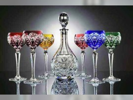 Set of colored hand cut wine glasses and the crystal carafe