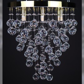 Lustres avec miroir rond et boules de cristal disposées en forme de cône - intérieurs d'appartements et d'entreprises