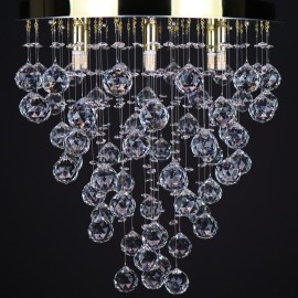 Lustres avec miroir rond et boules de cristal disposées en forme de cône - intérieurs d'appartements et d'entreprises